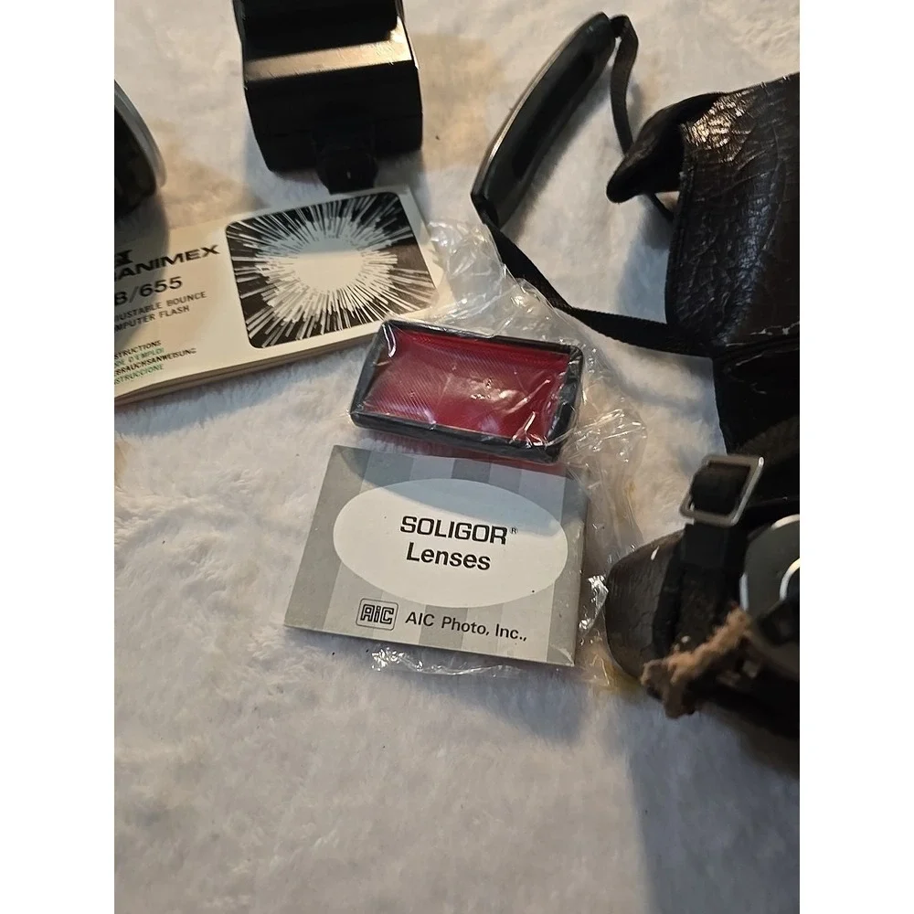 Classic Canon AE-1 Program Camera Bundle‎ with 50mm Lens & Protective Carry Case